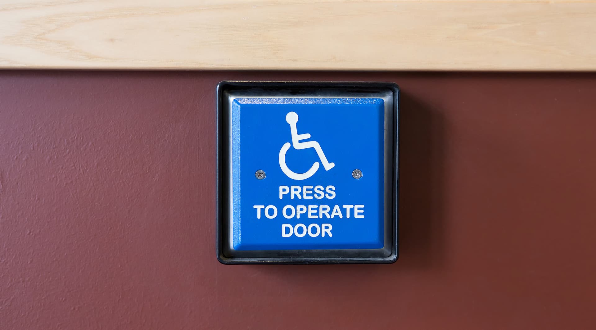 Automatic power door operator on an office building entrance